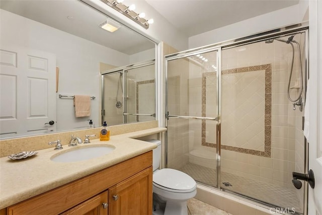 18 Corte Sevilla, San Clemente, CA 92673 - full bath with toilet, vanity, a stall shower, and tile patterned flooring