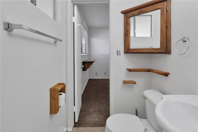 305 Beverly Ave, Barstow, CA 92311 - half bathroom featuring toilet and a sink