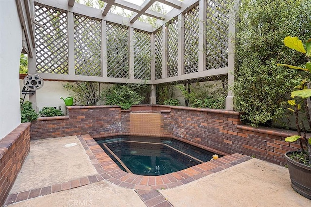 view of swimming pool with a pergola and an in ground hot tub