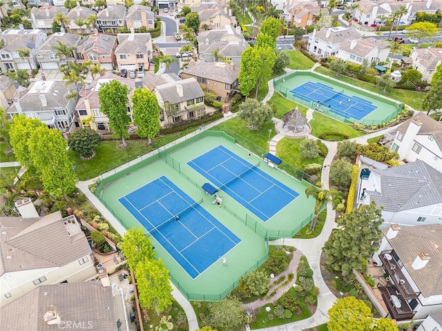 birds eye view of property with a residential view
