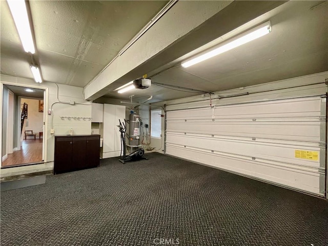 21062 Quail Run Dr, Diamond Bar, CA 91789 - garage with strapped water heater and a garage door opener