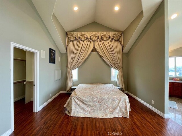 21062 Quail Run Dr, Diamond Bar, CA 91789 - bedroom featuring vaulted ceiling, dark wood-style floors, a spacious closet, and recessed lighting