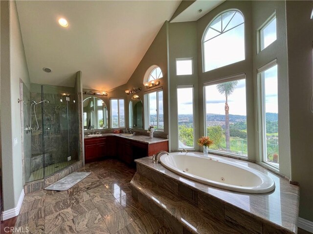 21062 Quail Run Dr, Diamond Bar, CA 91789 - full bath with a whirlpool tub, a shower stall, double vanity, high vaulted ceiling, and marble tiled flooring