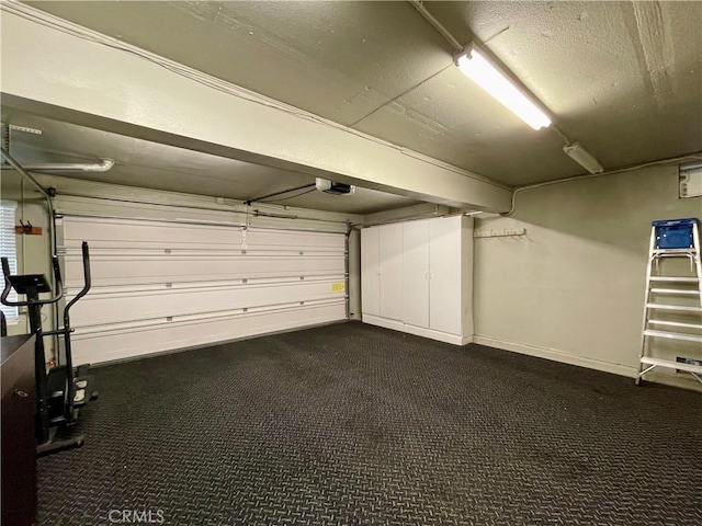 21062 Quail Run Dr, Diamond Bar, CA 91789 - garage with a garage door opener and baseboards