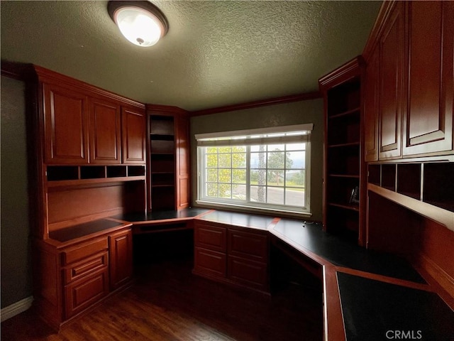 21062 Quail Run Dr, Diamond Bar, CA 91789 - unfurnished office featuring built in desk, dark wood-style floors, and a textured ceiling