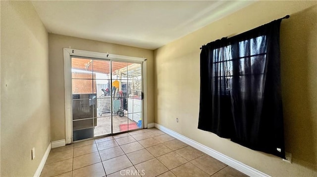 10108 Klingerman St, South El Monte, CA 91733 - spare room featuring baseboards and light tile patterned flooring
