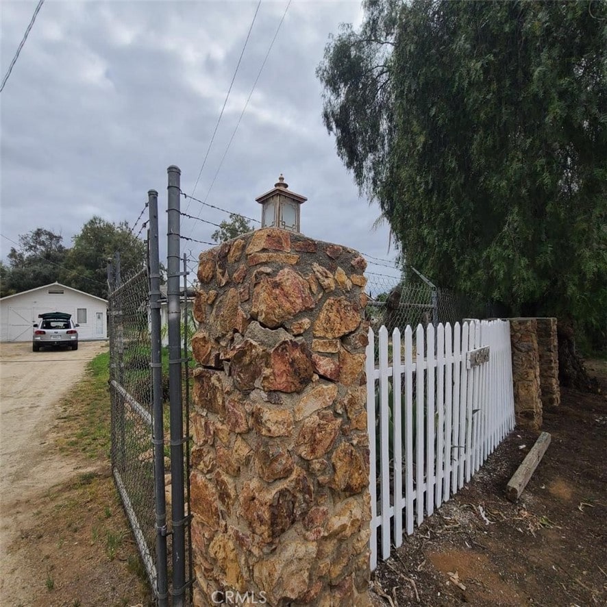 10560 Robinson Ave, Riverside, CA 92505 - view of gate featuring fence
