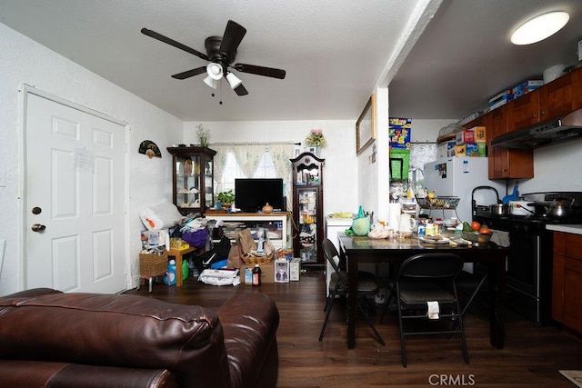 living room featuring wood finished floors and ceiling fan