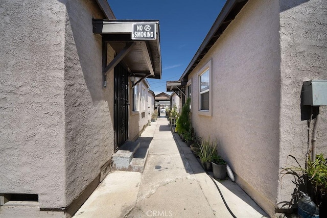 view of home's exterior with stucco siding