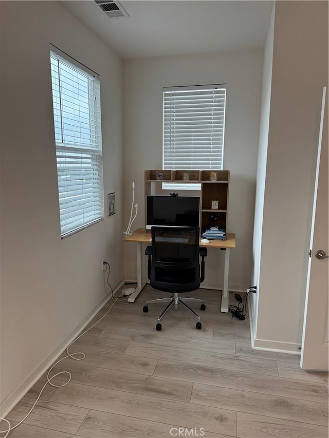 8823 Jacaranda Unit F, Montclair, CA 91763 - home office with wood finished floors and baseboards