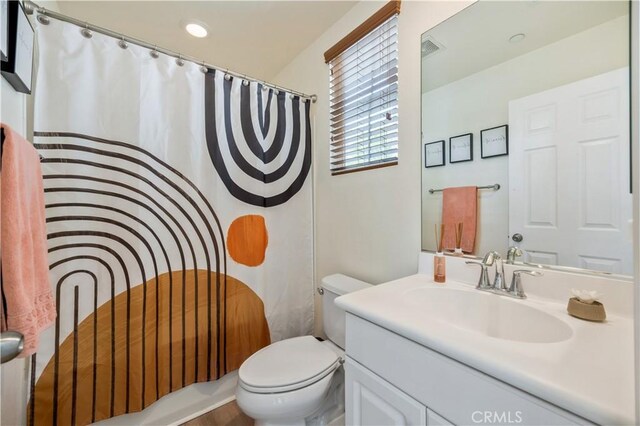 372 W Linden Dr, Orange, CA 92865 - bathroom featuring toilet, vanity, and a shower with curtain