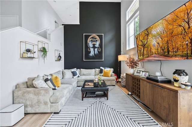 372 W Linden Dr, Orange, CA 92865 - living area with a towering ceiling and wood finished floors
