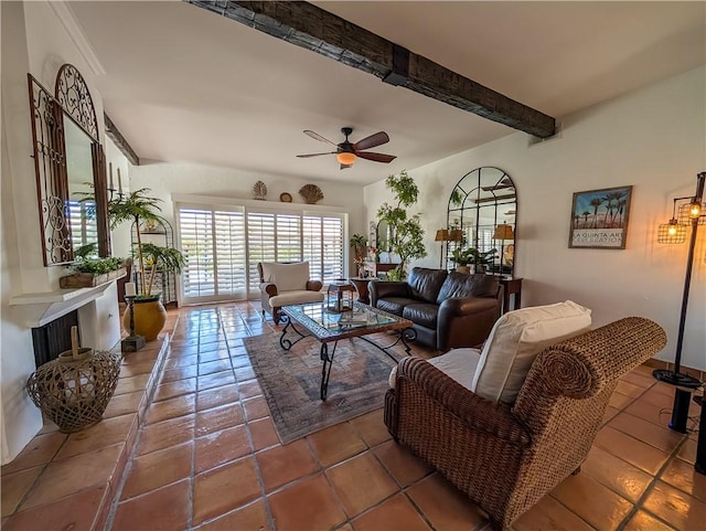 48143 Calle Seranas Ln, Quinta, CA 92253 - living room with beamed ceiling, tile patterned floors, and a ceiling fan