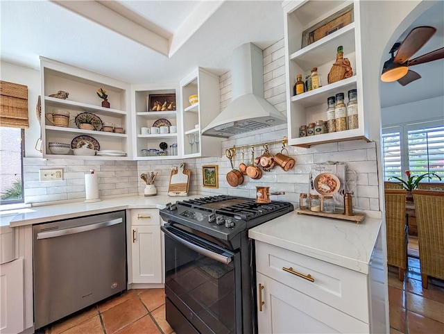 48143 Calle Seranas Ln, Quinta, CA 92253 - kitchen featuring stainless steel dishwasher, black range with gas stovetop, open shelves, and wall chimney exhaust hood