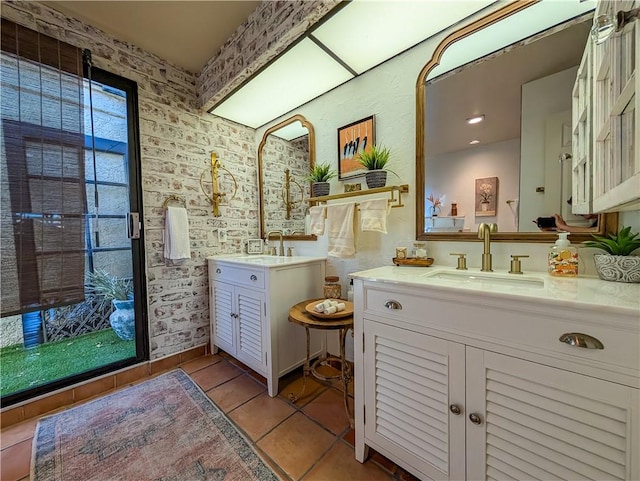 48143 Calle Seranas Ln, Quinta, CA 92253 - full bathroom featuring two vanities, tile patterned flooring, and a sink