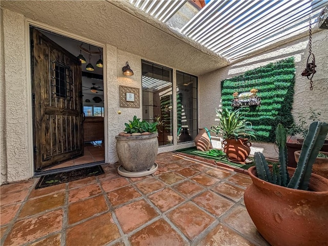 48143 Calle Seranas Ln, Quinta, CA 92253 - entrance to property featuring stucco siding, a patio area, and french doors