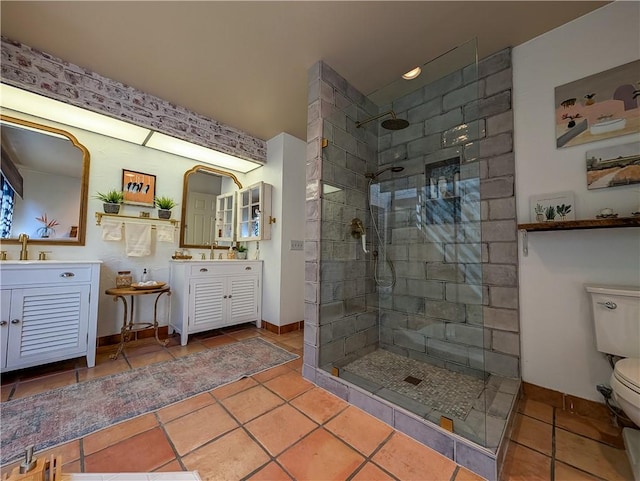 48143 Calle Seranas Ln, Quinta, CA 92253 - bathroom featuring tile patterned floors, toilet, vanity, and a walk in shower