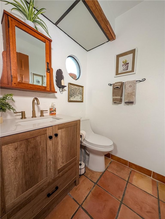 48143 Calle Seranas Ln, Quinta, CA 92253 - bathroom with toilet, vanity, and tile patterned floors