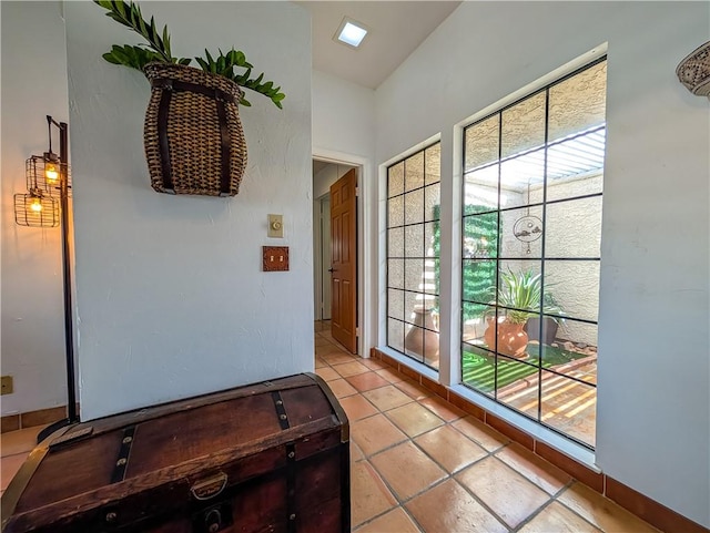 48143 Calle Seranas Ln, Quinta, CA 92253 - entryway featuring a wealth of natural light and light tile patterned floors