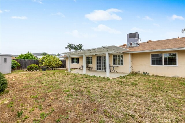26481 Jamestown Dr, Menifee, CA 92586 - rear view of property with a pergola and a patio area