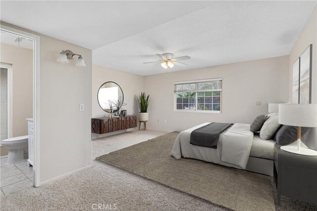 26481 Jamestown Dr, Menifee, CA 92586 - bedroom with carpet floors, a ceiling fan, and ensuite bath