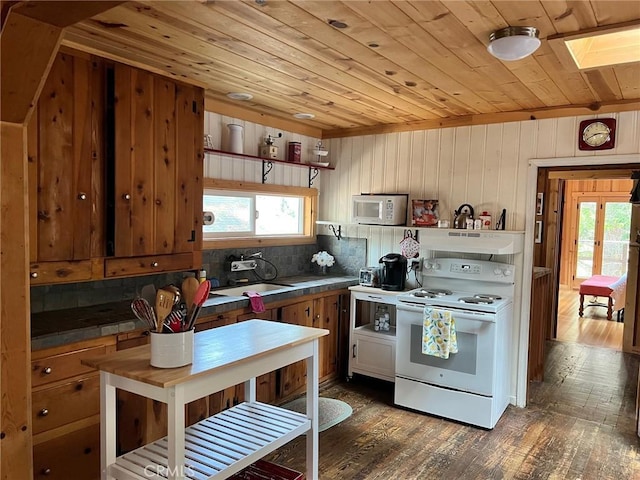 15 Toyon Trl, Berry Creek, CA 95916 - kitchen featuring white appliances, wood ceiling, dark wood finished floors, open shelves, and wood walls