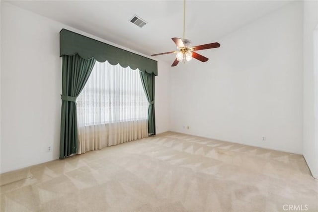 2596 Pine Castle Dr, Hanford, CA 93230 - carpeted empty room featuring a ceiling fan and visible vents