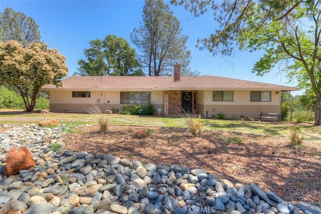 ranch-style home with a chimney and crawl space