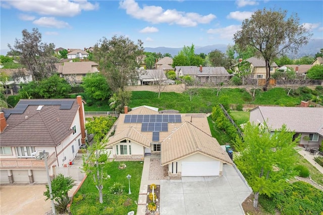 drone / aerial view with a residential view and a mountain view