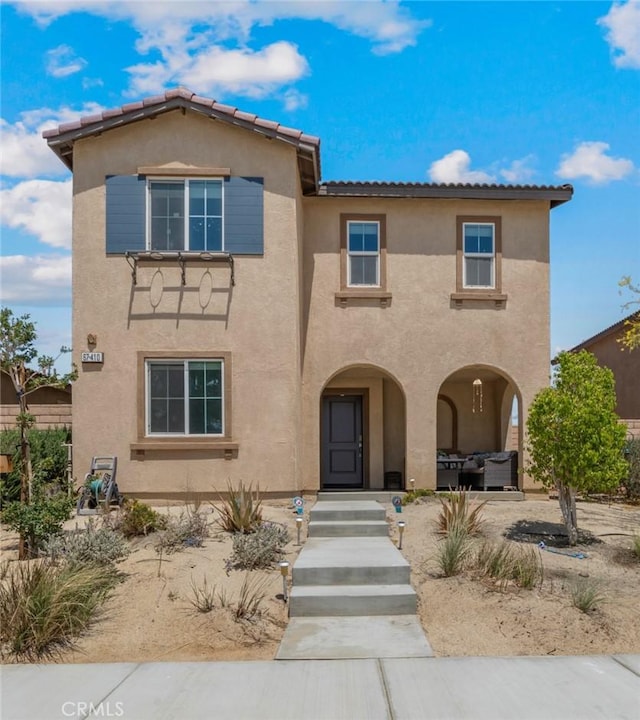 67410 Rio Vista Dr, Cathedral City, CA 92234 - view of front facade with stucco siding and a tile roof
