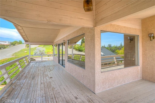 wooden terrace with covered porch