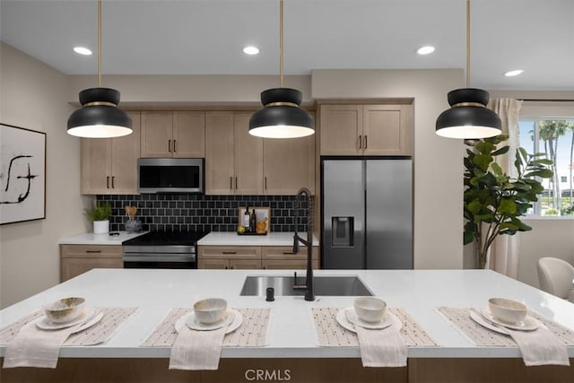152 Balsawood, Tustin, CA 92780 - kitchen featuring stainless steel appliances, light countertops, and decorative backsplash