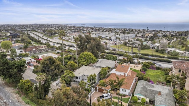 aerial view featuring a residential view and a water view