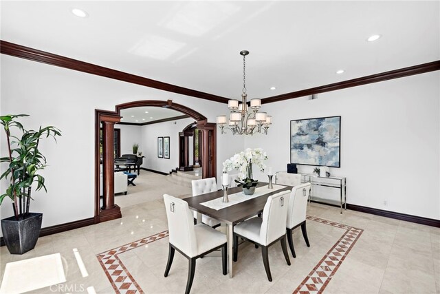 6 Riverstone, Laguna Niguel, CA 92677 - dining room with recessed lighting, ornate columns, arched walkways, baseboards, and a chandelier
