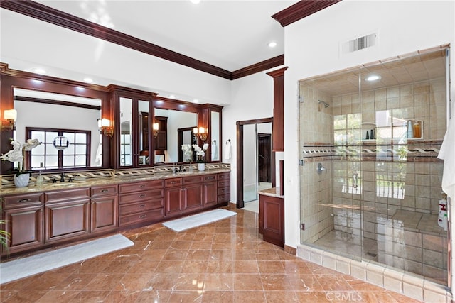 6 Riverstone, Laguna Niguel, CA 92677 - bathroom with crown molding, a sink, a stall shower, double vanity, and visible vents
