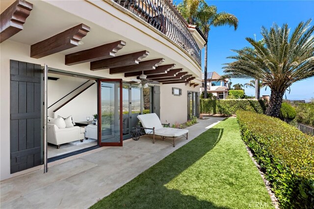 6 Riverstone, Laguna Niguel, CA 92677 - view of yard featuring a patio area, a balcony, and ceiling fan