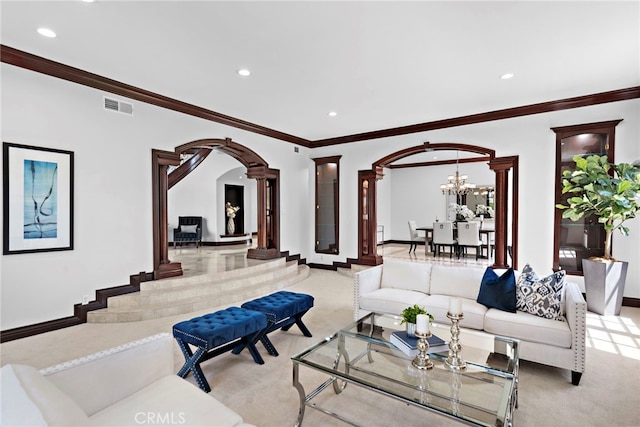 6 Riverstone, Laguna Niguel, CA 92677 - living room with light colored carpet, arched walkways, recessed lighting, and ornate columns