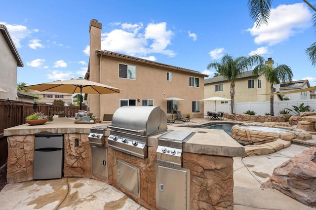 view of patio / terrace featuring a fenced backyard and area for grilling