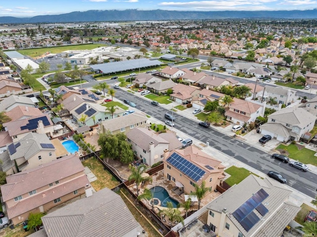 aerial view featuring a mountain view and a residential view