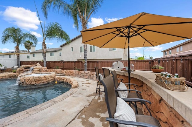 exterior space with a fenced backyard and a fenced in pool