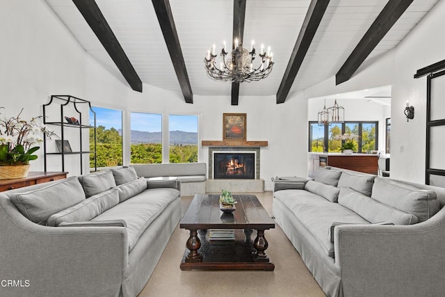 1270 Dove Meadow Rd, Solvang, CA 93463 - living area featuring a chandelier, a glass covered fireplace, and a mountain view