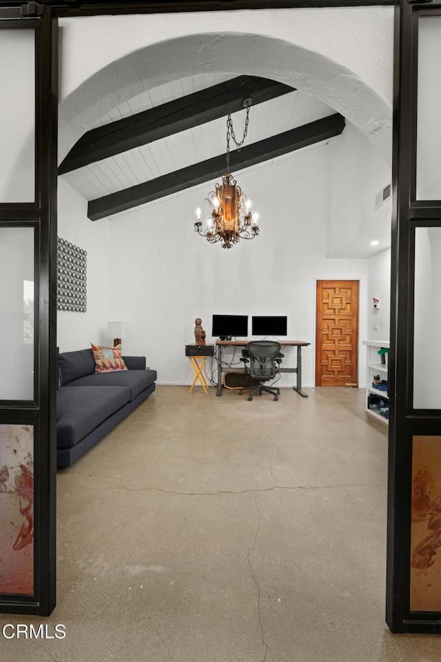 1270 Dove Meadow Rd, Solvang, CA 93463 - living area featuring a desk, a chandelier, finished concrete floors, and arched walkways