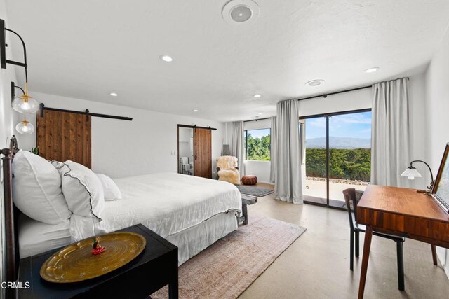 1270 Dove Meadow Rd, Solvang, CA 93463 - bedroom featuring a barn door, access to exterior, finished concrete flooring, and recessed lighting