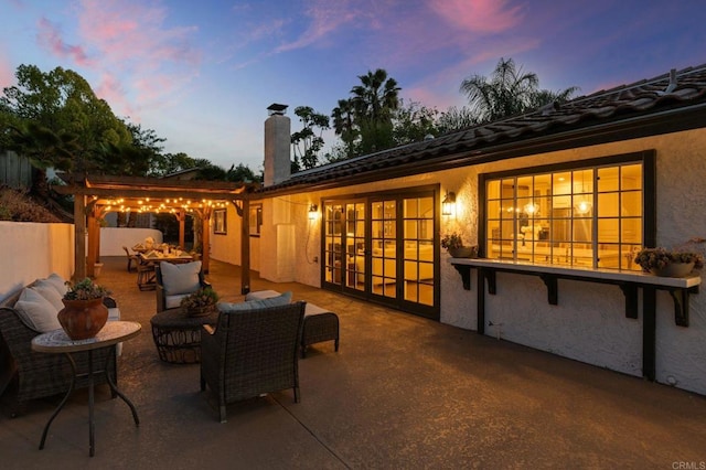 view of patio / terrace featuring fence and outdoor lounge area