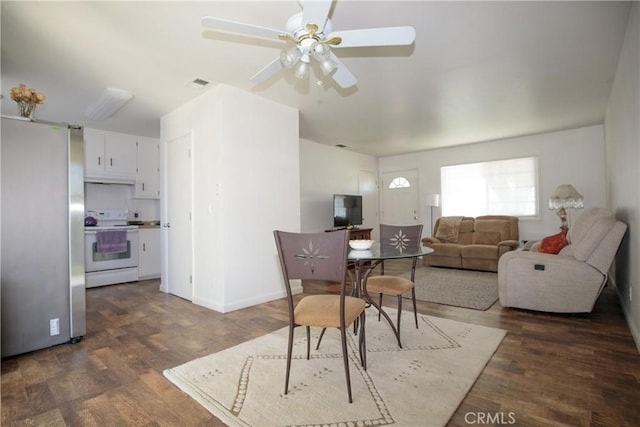 272 Rio Bravo Ct, Corning, CA 96021 - dining space with baseboards, wood finished floors, visible vents, and a ceiling fan