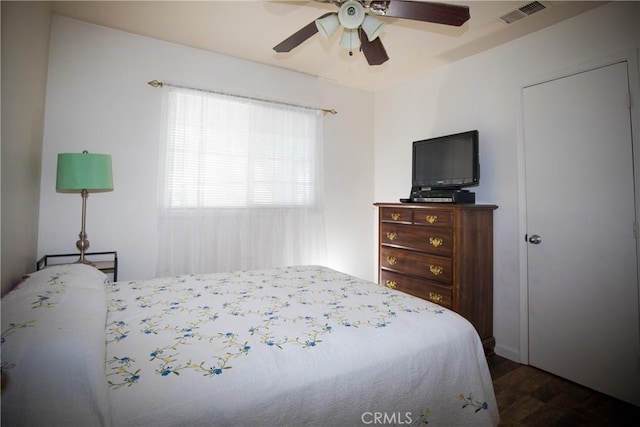 272 Rio Bravo Ct, Corning, CA 96021 - bedroom featuring a ceiling fan, dark wood-type flooring, and visible vents