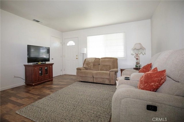 272 Rio Bravo Ct, Corning, CA 96021 - living area with baseboards, wood finished floors, and visible vents