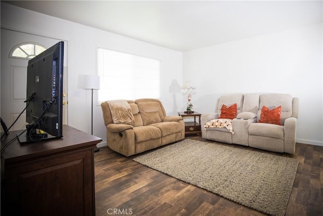 272 Rio Bravo Ct, Corning, CA 96021 - living area with baseboards and dark wood-style floors