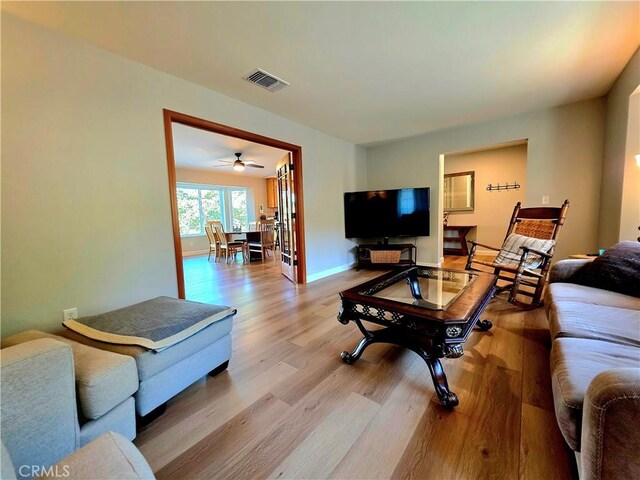 47180 Lookout Mountain Dr, Coarsegold, CA 93614 - living room featuring light wood-style floors and baseboards