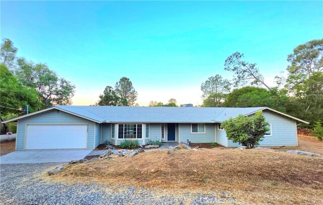 47180 Lookout Mountain Dr, Coarsegold, CA 93614 - single story home with an attached garage and concrete driveway